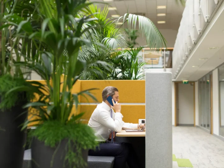 Man On Phone In Pod